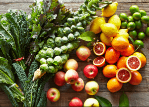 a group of fruits and vegetables on a wood surface Healthy Weight Loss Diets Middleton Park